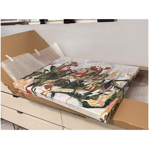 Abstract white and coral and green abstract painting in a fedex box with bubble wrap on a white surface.