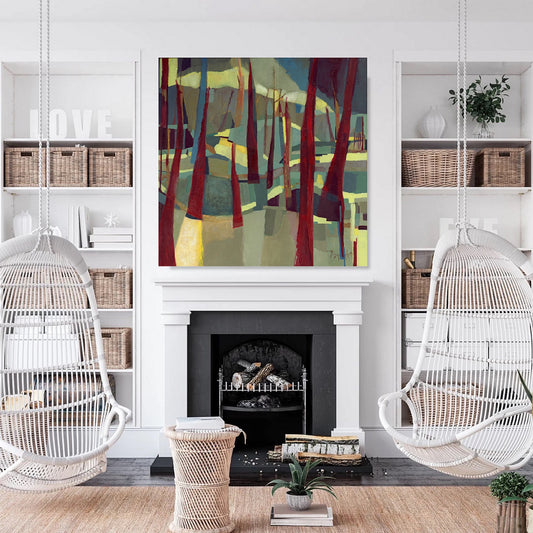Original nature inspired oil painting featuring maroon abstract trees on green and teal background installed on white wall over white fireplace in a room with modern decor.