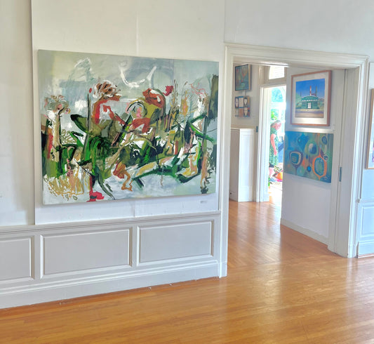 large white and green abstract botanical painting on canvas created by artist danielle nelisse installed on white wall of art gallery 